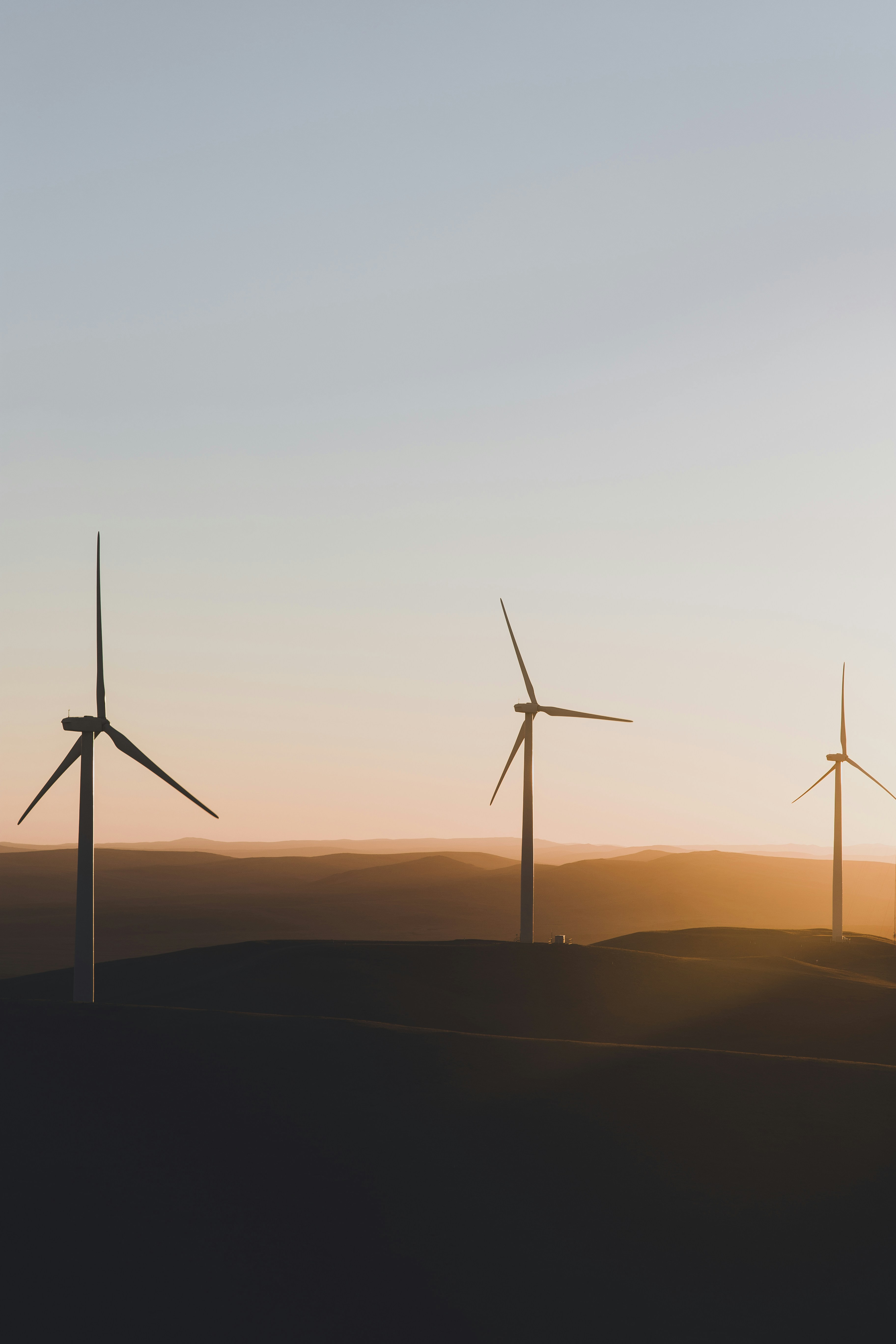 Picture of wind turbines in the mountains.